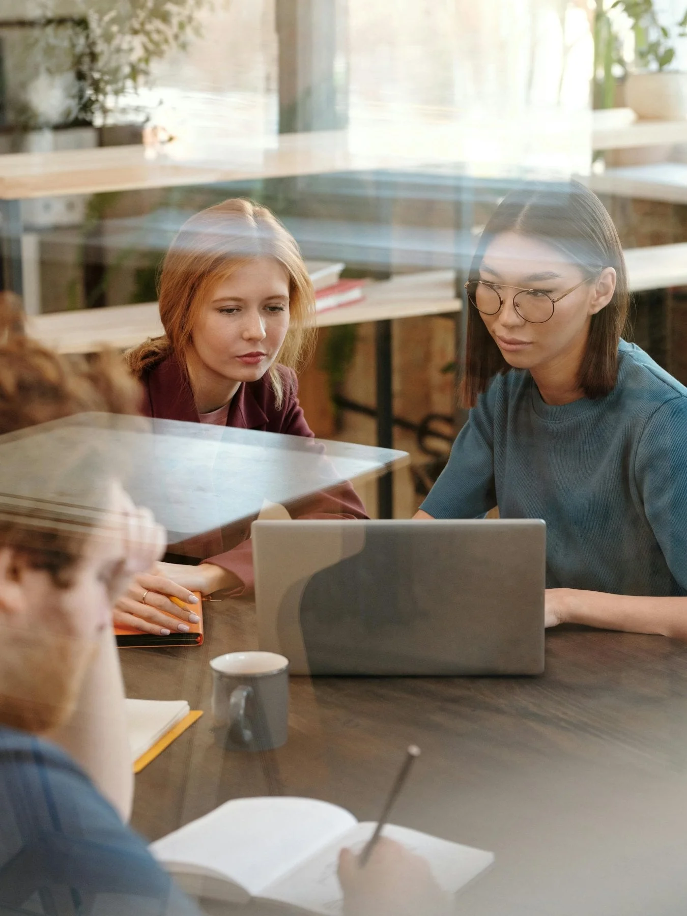 Business owner managing Shopify store from laptop